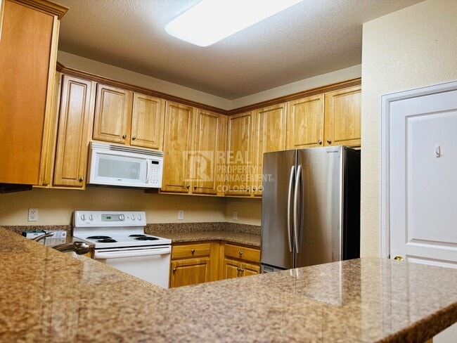 Building Photo - 10341 W Girton Dr