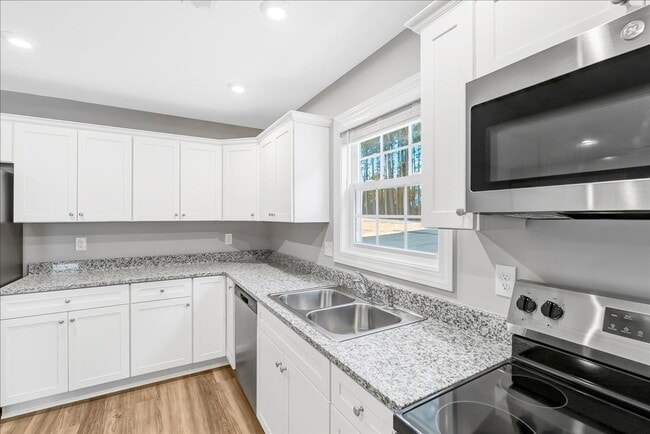 Building Photo - New Construction 3 Bedroom/2 Bathroom Homes with Garage