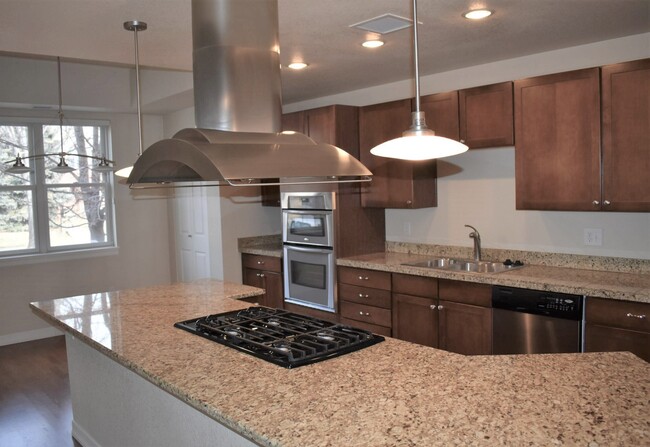 Gourmet Kitchen with gas range and vent - 2200 S University Blvd