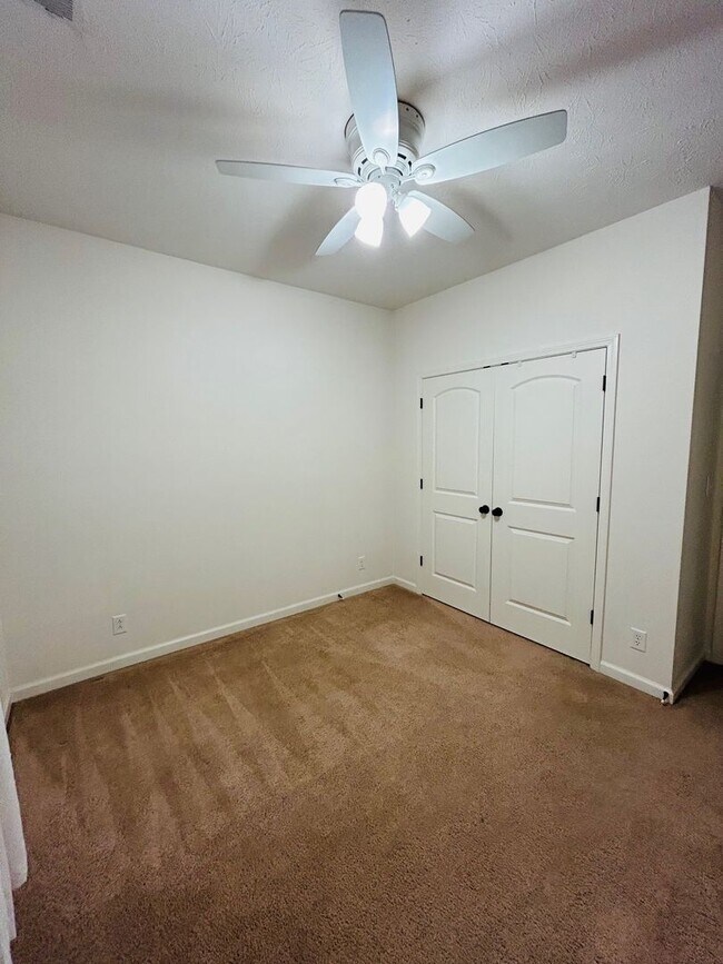 Building Photo - House with Fenced Backyard