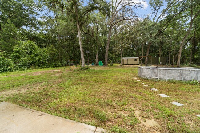 Building Photo - Comfort & Style Meet in This Beautiful 4 Bedroom Midway Home
