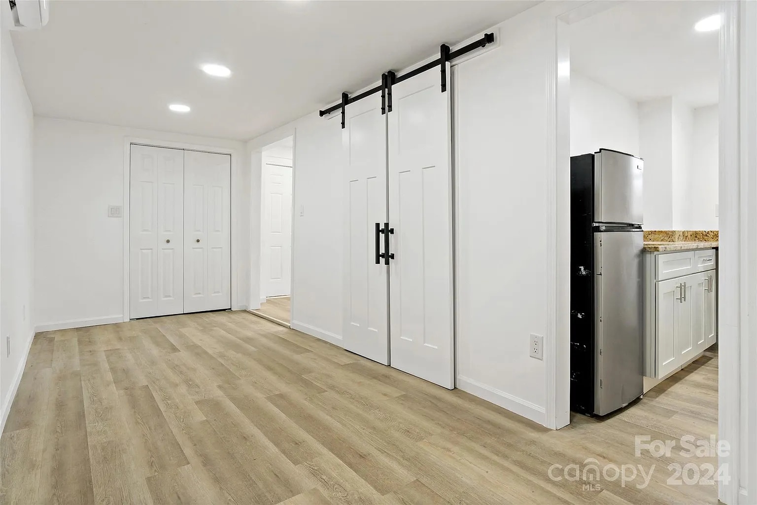 Main room looking towards closet and secondary room - 228 Barrett Rd
