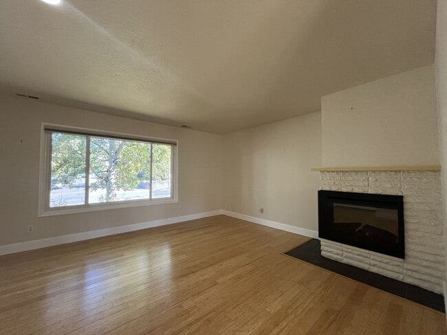 Building Photo - Light-Filled Home with Open Layout, Modern...