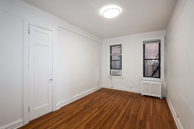 Building Photo - 11525 Metropolitan Avenue, 233