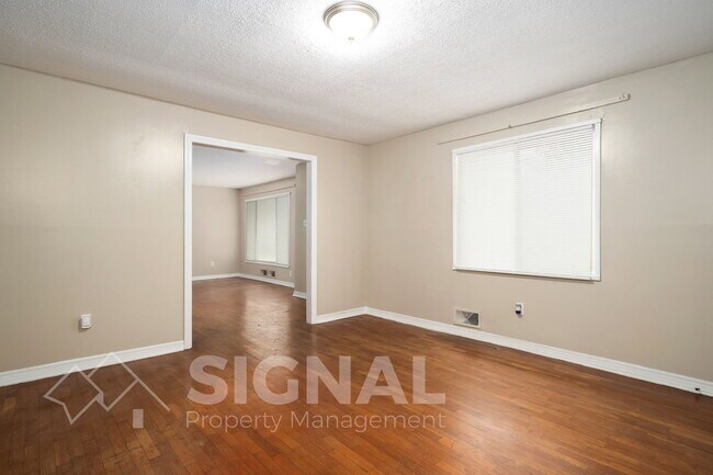 Building Photo - 5117 Highland Ave