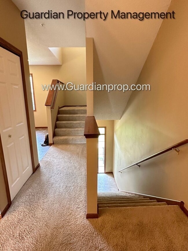 Building Photo - Pet Free Champlin Town Home, 3.5 Baths, 2 Car Garage, Dishwasher, Balcony, Available end of April