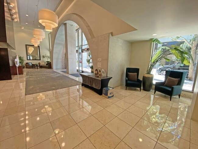 Building Photo - Live at The Axis High-Rise! Upscale, Urban...