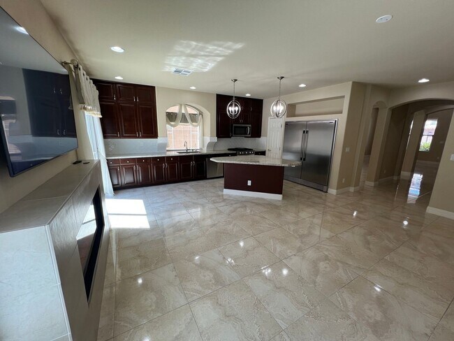 Building Photo - A Fantastic 4 Bedroom Home with the primary Downstairs, in Silverado Ranch
