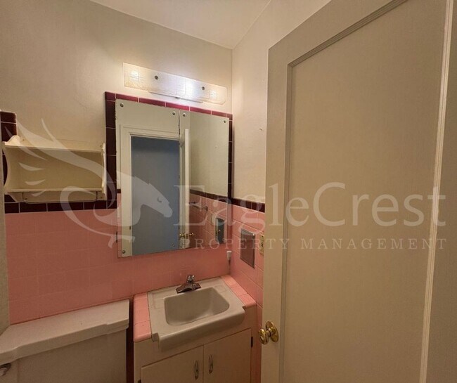 Building Photo - Three Bedroom, Two Bathroom House with Fenced Yard and Outdoor Fireplace
