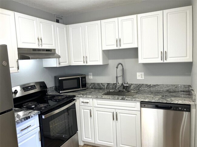 Building Photo - 11703 Raintree Village Blvd