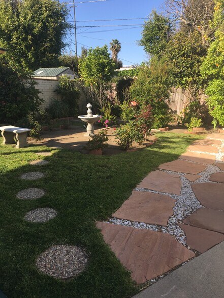 Outdoor garden (walkway entrance to unit) - 1950 S Bentley Ave