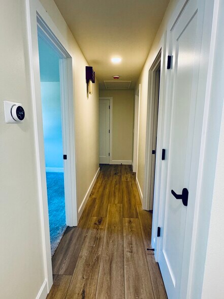 Hallway to bed/baths - 11965 NW Oatfield Ct