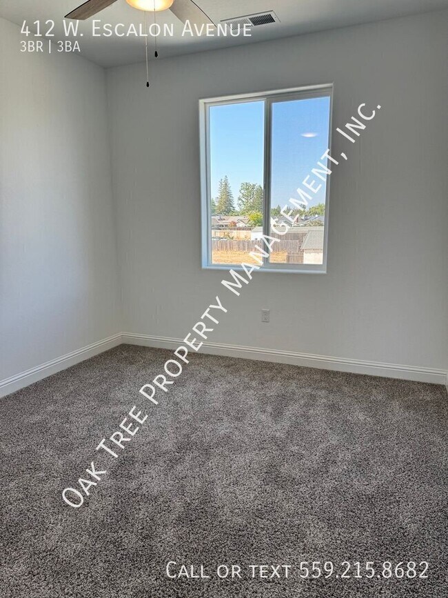 Building Photo - 412 W Escalon Ave