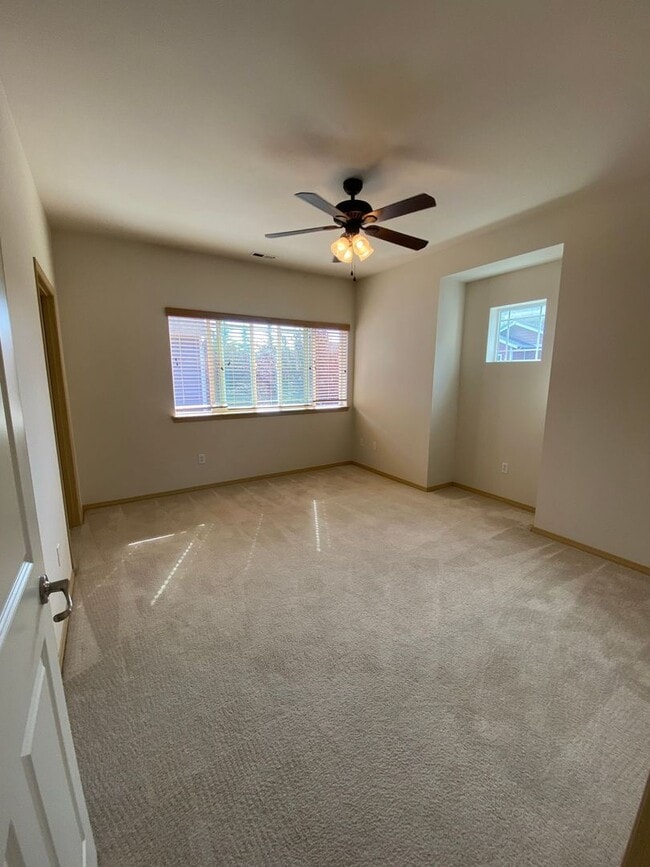 Building Photo - No Mower Needed! Great Townhome In A Beautifully HOA Maintained Community