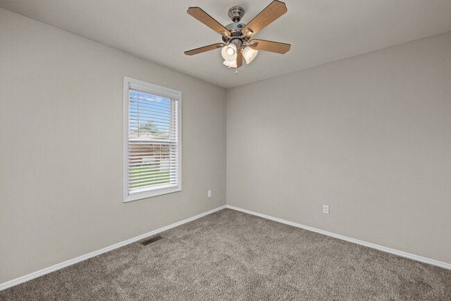 Two Bedroom Garden Remodel with Fireplace | Dining Space - Woods Mill Park Apartments & Townhomes