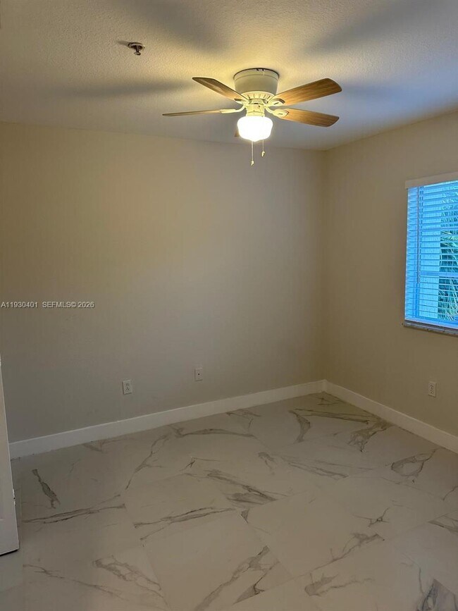 Building Photo - 12421 SW 50th Ct