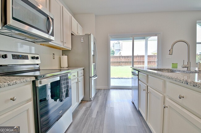 Building Photo - 8077 Rudder Cir