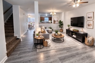 Spacious living room with updated flooring - 7 Lotus Dr