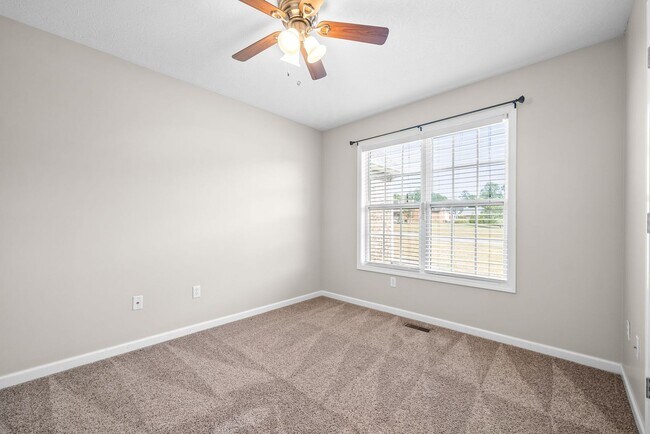 Building Photo - Pet Friendly Three Bedroom with Bonus!
