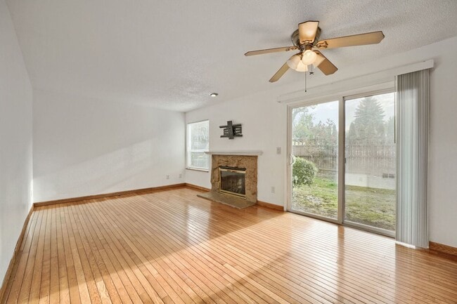 Building Photo - AVAILABLE NOW! 2BR/2BA Condo – Awesome Location! Glossy Hardwoods, Granite Countertops, W/S/G Inc...
