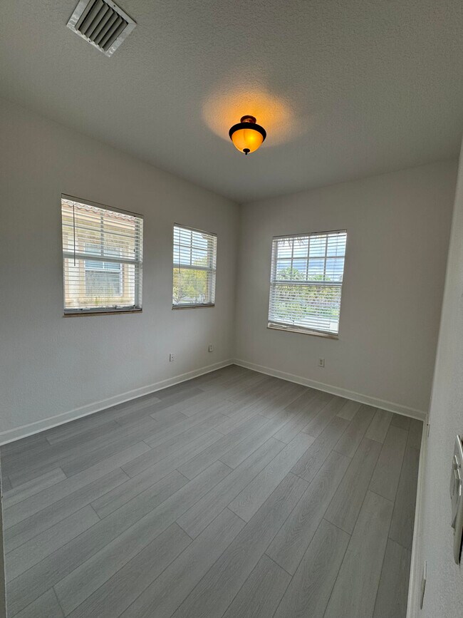 Building Photo - 6074 NW 116th Dr