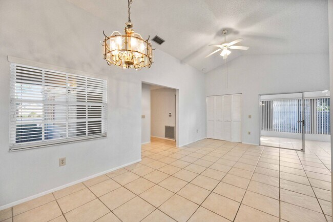 Building Photo - Beautiful Must See!! 3/2 Plus Sunroom & Garage!!  Gated Community!!