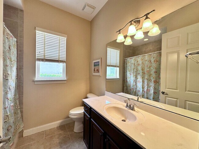 Building Photo - Gated Community! Walking Distance to the B...