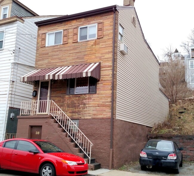 Building Photo - Renovated 2BD/1BATH House - Off-Street Parking, Laundry, AC