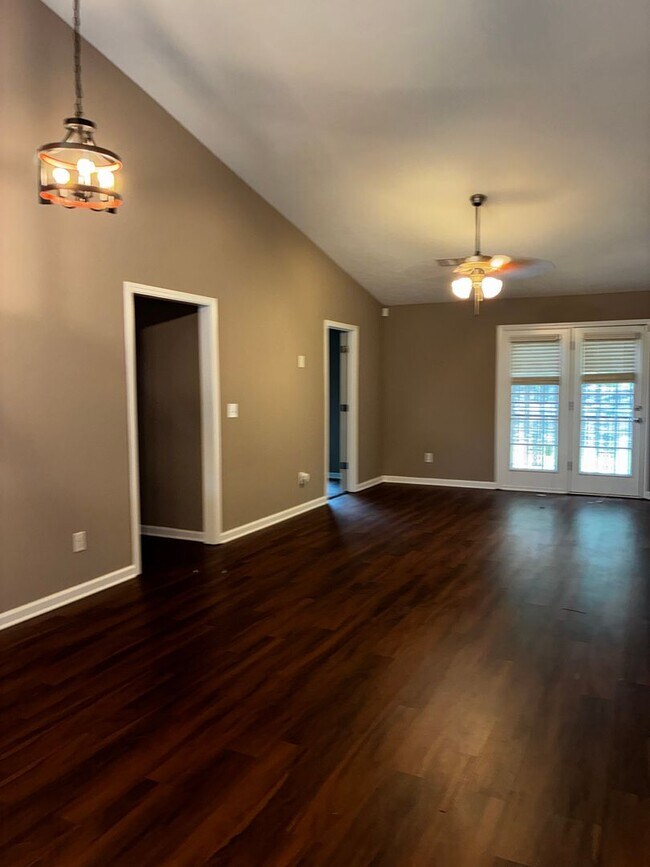 Building Photo - Of course! The marketing title iElegant 3-Bedroom Townhouse with Modern Comforts.