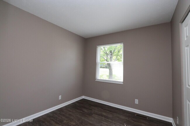 Building Photo - 6810 Village Green Blvd