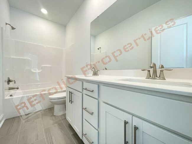 Building Photo - Beautiful Brand New 4 Bedroom, 3 Bathroom ...
