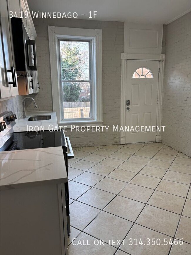 Building Photo - 3419 Winnebago-1F