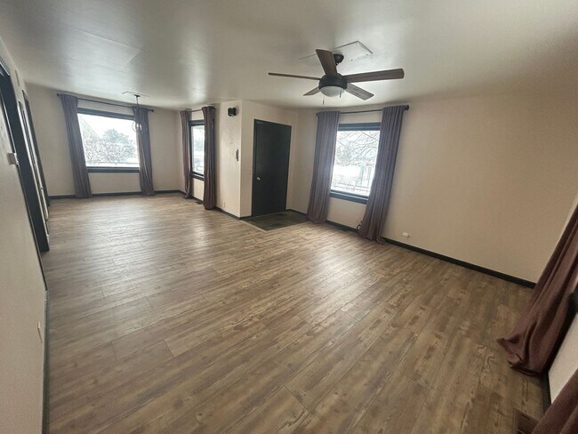 Building Photo - Bigfork Rodeo Farmhouse~ Fenced garden, greenhouse, garage, barn and shop!