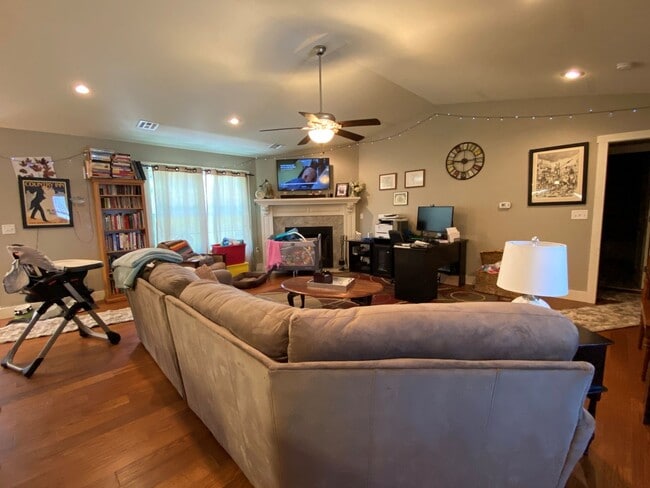 Building Photo - FENCED BACKYARD! BONUS ROOM/OFFICE! SAFE ROOM! THREE CAR GARAGE