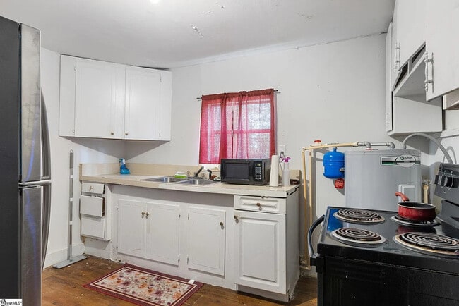 Building Photo - 1 Bedroom 1 Bathroom Duplex