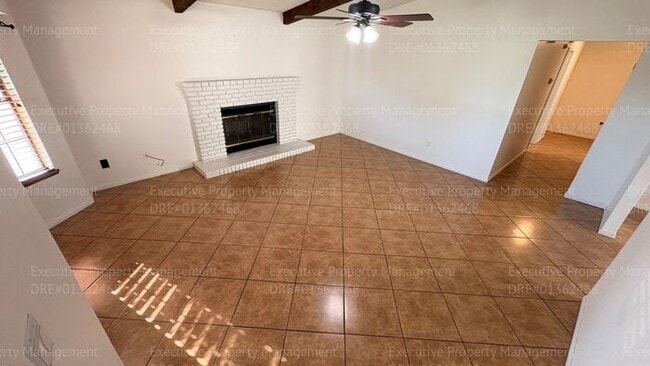 Building Photo - 3 bedroom 2 bathroom home on a corner lot with extra fenced parking.