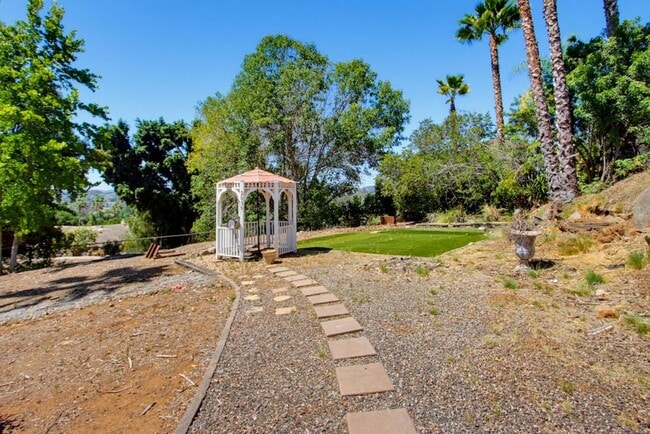 Building Photo - Peaceful Country Living - 3 Bedroom on 1/2 Acre, Available Now!