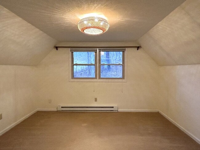 Building Photo - Light-Filled 3BR Home with Wraparound Deck, Convenient to Town