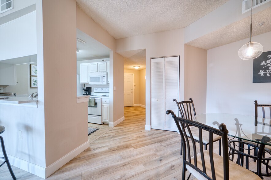 Dining to Kitchen and Foyer - 5551 Bentgrass Dr