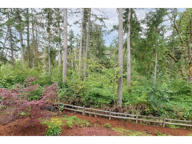 Building Photo - Bright and Open Floor Plan with Fireplace, Attached Garage & Vaulted Ceilings