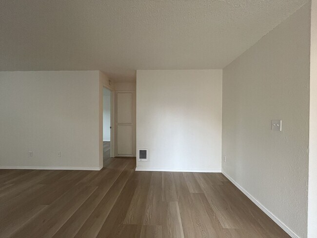 Building Photo - Inviting 2 Bedroom Home with Open Layout, Stainless Steel Appliances & Private Outdoor Retreat