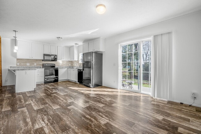 Building Photo - Sheridan Duplex Unit (no garage)