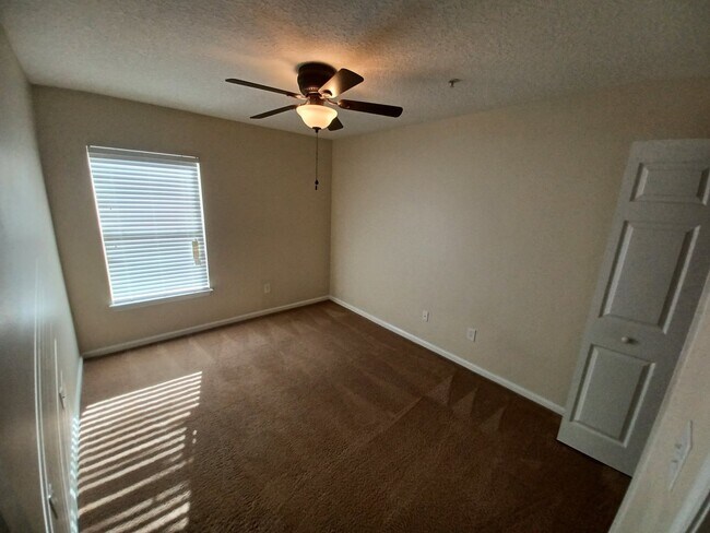 Building Photo - "$500 MOVE-IN SPECIAL! - Beautifully Updated 2/2 Condo in Gated Southside Neighborhood!"
