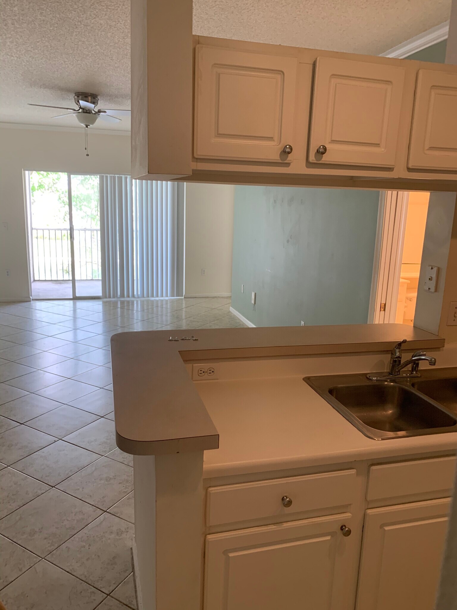 living room and open kitchen - 11655 W Atlantic Blvd