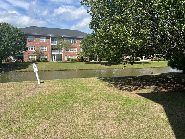 Building Photo - First Floor, End Unit, Two bedroom, Two ba...
