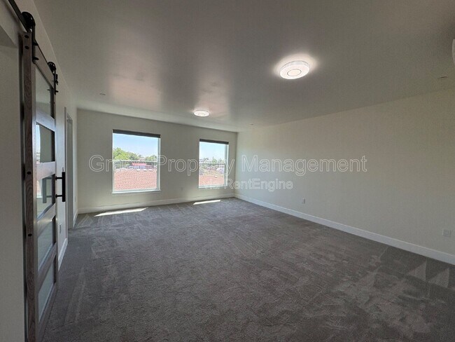 Building Photo - 3572 W 66th Ave