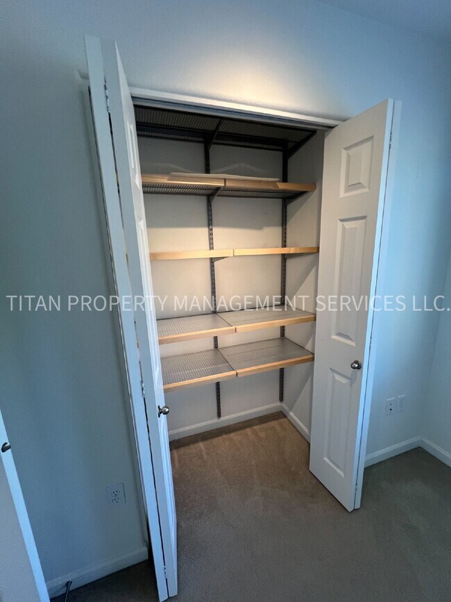 Building Photo - Beautiful Three Story Townhouse with Gas Fireplace, Balcony & 2-Car Garage