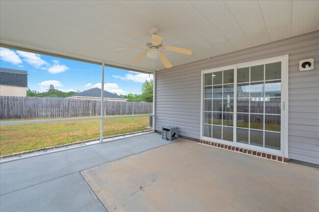 Building Photo - Spacious 5-Bedroom Home with Screened Patio & Private Fenced Yard in Guyton