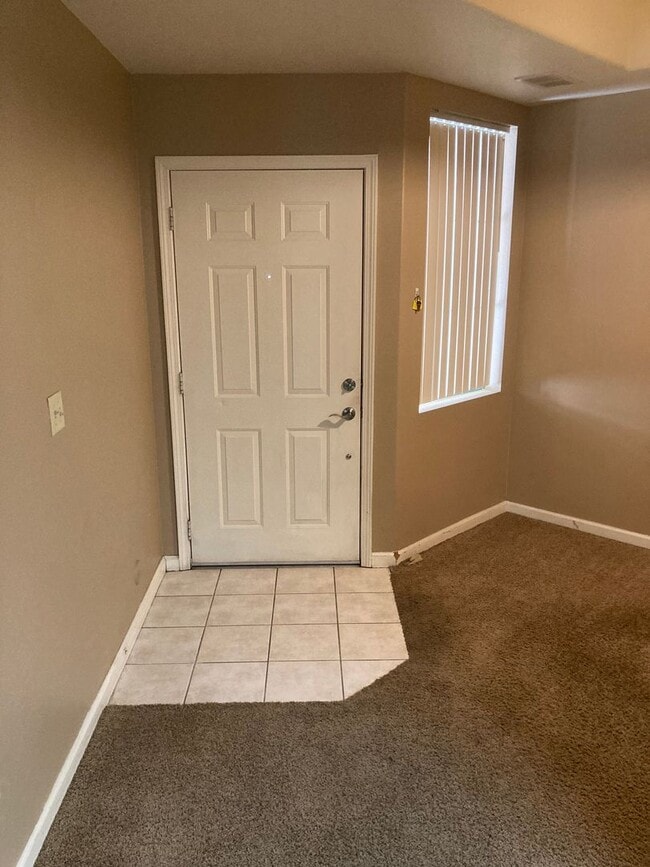 Building Photo - Tanamera Resort Gated Community.  One bedroom, one full bathroom, one car attached garage.