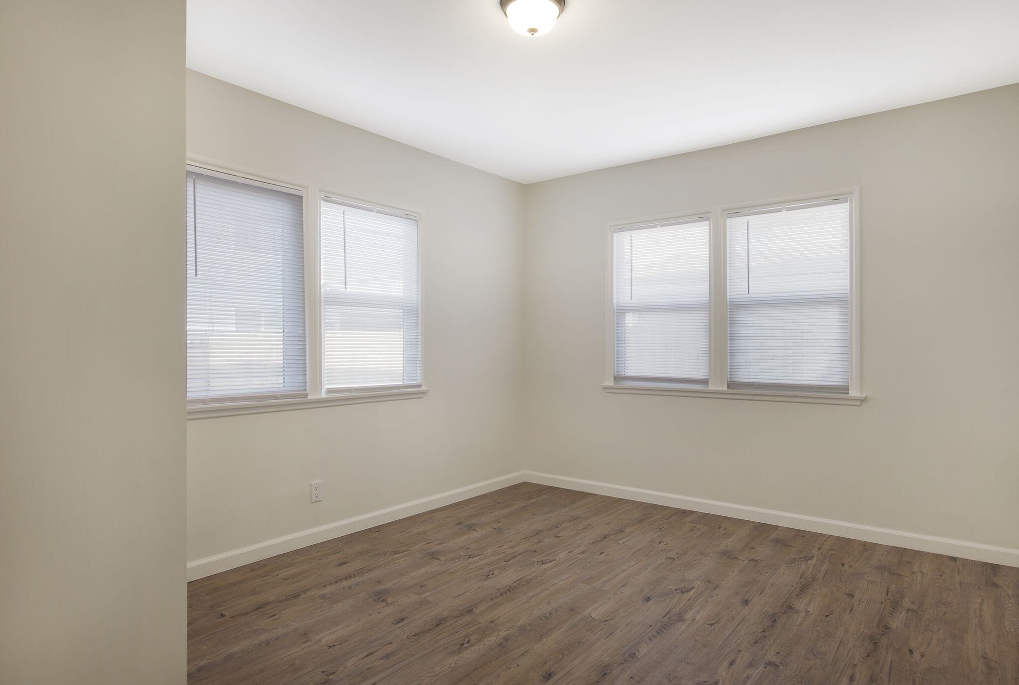 bedroom with double pane windows - 4091 Rosecrans Ave